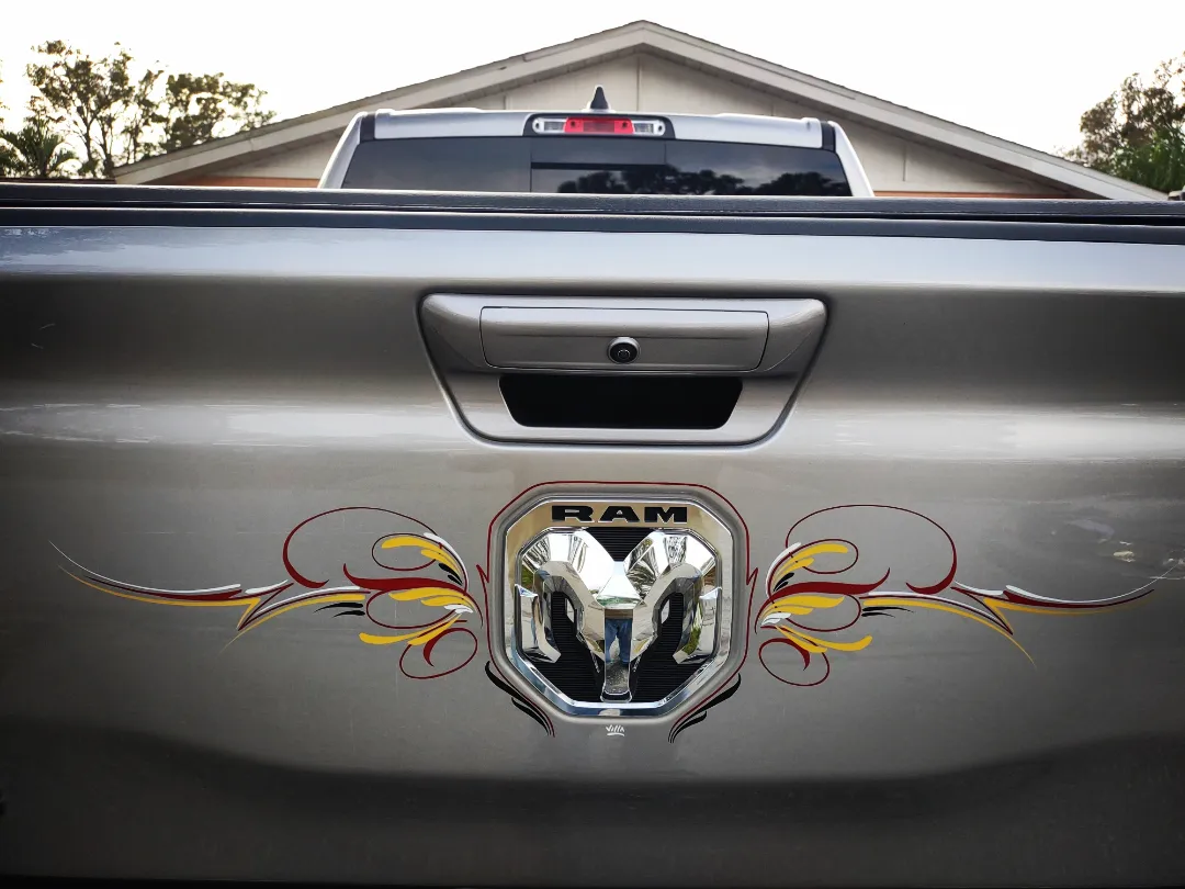 Scrolls by Freddie Villa on a Pickup Tailgate from Florida 33563